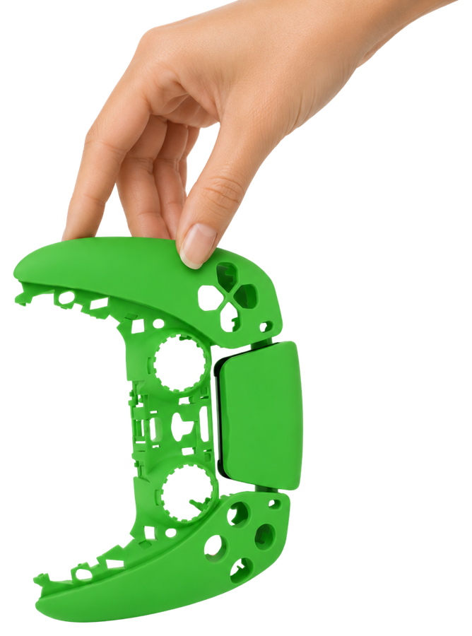 A hand selecting a green controller shell